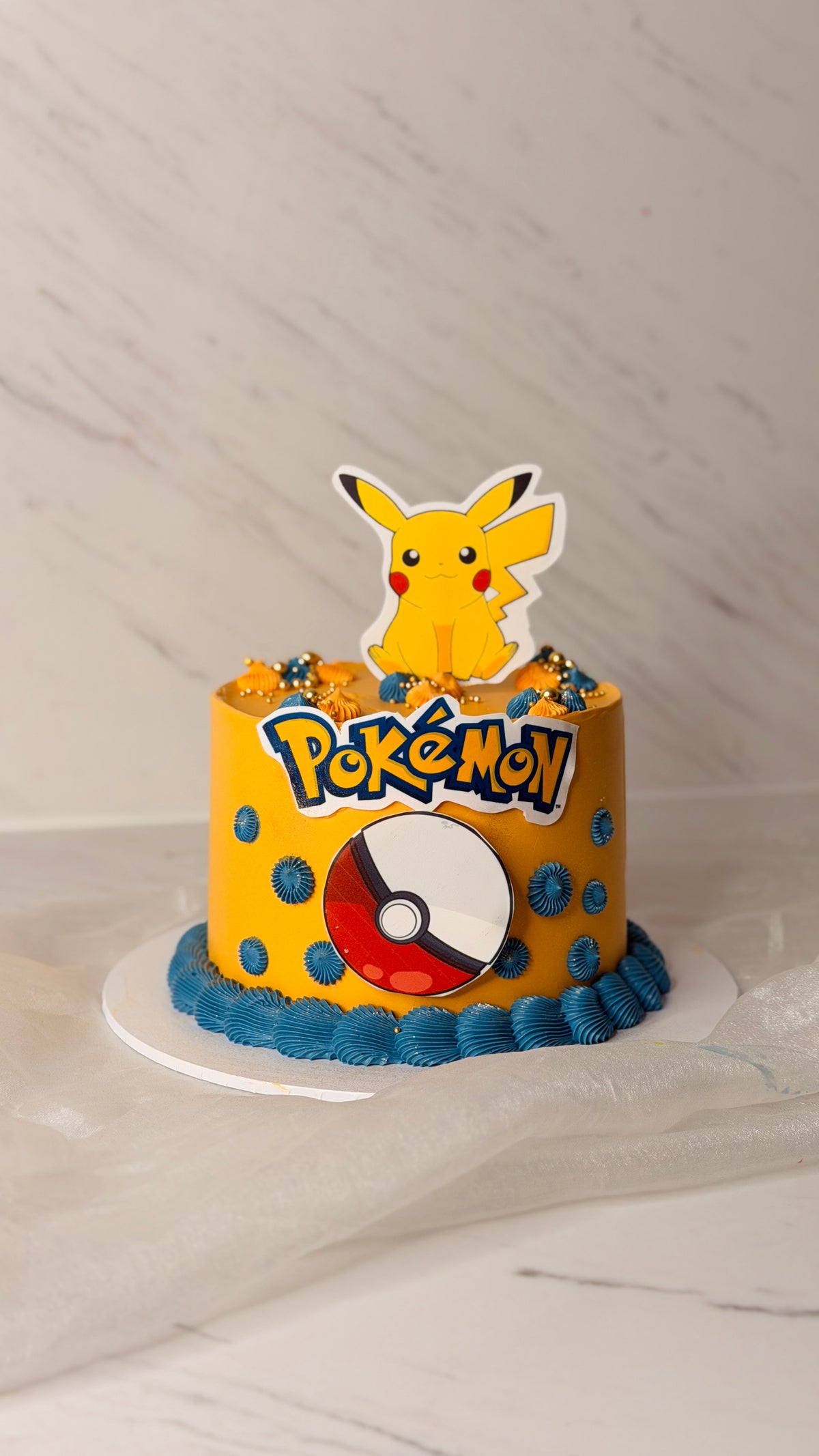 Custom Pokemon cake with Pikachu design and Poké Ball topper, handcrafted by CCT Sydney